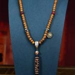 Tibetan 9-Eye Dzi Pendant with Aged Star-Moon Bodhi Mala – Sacred Necklace for Wisdom and Power - Image 2