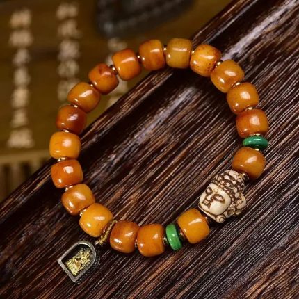 Tibetan-Yak-Bone-Barrel-Bead-Wrist-Mala-–-Guanyin-Head-Bead-for-Compassion-Protection2