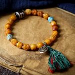 Tibetan-Yak-Bone-Bracelet-with-Heaven-Earth-Dzi-Bead-–-Handcrafted-Sacred-Amulet