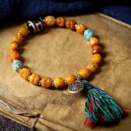 Tibetan-Yak-Bone-Bracelet-with-Heaven-Earth-Dzi-Bead-–-Handcrafted-Sacred-Amulet