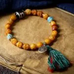 Tibetan-Yak-Bone-Bracelet-with-Heaven-Earth-Dzi-Bead-–-Handcrafted-Sacred-Amulet